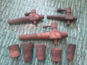 lot 70 image: (K) 3 Antique Wood Wine Barrel Spigots and 5 Wood Barrel Corks
