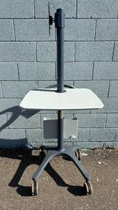 lot 7 image: MSRP $1800 Ergotron Anthro Zido 25 Height Adjustable Monitor Mount Standing Desk Cart with Item Supply Basket - In Excellent Condition