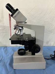 lot 57 image: MSRP $2600 Nikon Model SC Power Illuminating Binocular&nbspCompound Microscope w Eyepieces &amp 4 Objectives -&nbspGreat Working Condition