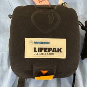 lot 60 image: WOW MSRP $2500 Medtronic Physio Control LIFEPAK CR Plus AED Emergency Defibrillator W2023 Pads -Fully Automatic AHA Voice Prompt With both voice and graphic prompts - Great Working Condition No Reserve