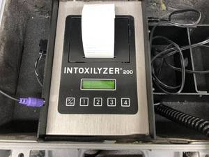 lot 58 image: Impress Your Friends&nbsp Law Enforcement Professional CMI Inc. Intoxilyzer 200 Alcohol&nbspBreath Tester &amp&nbspPrinter Inside A Tough Pelican Case&nbspincludes a keyboard for test subject data entry&nbspGreat Working Condition