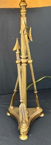 lot 33 image: Gold Colored Triple Arrow Based Table Lamp