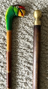 lot 55 image: Two Canes with Character and Hidden Flask