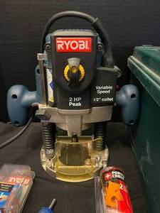 lot 293 image: Ryobi Two HP Variable Speed 12 Inch Collet Router Model RE180PL with Plastic Case