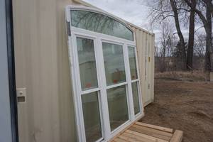 lot 12 image: Thermo Tech Large Vinyl Clad Fixed Casement Window With Top Arched Transom