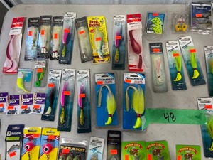 TABLE FULL OF FISHING ITEMS