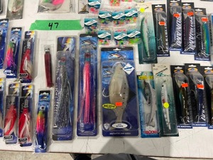 TABLE FULL OF FISHING ITEMS