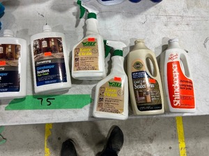 TABLE FULL OF FLOOR CLEANER