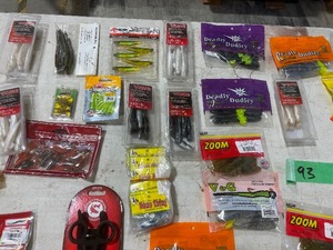 TABLE FULL OF FISHING PLASTICS
