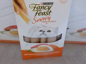 lot 93 image: 30 x 4 packs Purina Fancy Feast Savory Natural Salmon and Tuna in a Demi-Glaze Cat Treats- retail $3 each