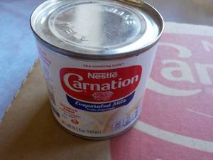lot 106 image: 24 x 5 oz Cans Nestle Carnation Evaporated Milk- past best date