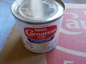 lot 108 image: 24 x 5 oz Cans Nestle Carnation Evaporated Milk- past best date