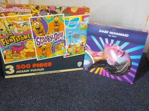 lot 115 image: 500 pc Puzzles new in box...