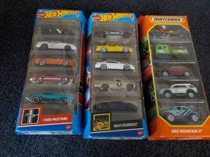 lot 140 image: 3 Hot Wheels and Match Box Cars- new in box