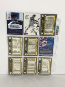 lot 37 image: Lot of 9 Baseball Cards - Reggie Jackson - Derek Jeter - Tug McGraw - Tommy John & More