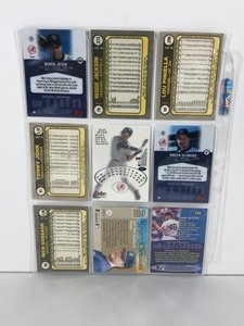 lot 39 image: Lot of 9 Baseball Cards - Reggie Jackson - Derek Jeter - Roger Clemens - Rich Gossage & More