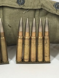 lot 58 image: Vintage Military Rounds in Clips with Carrying Pouch