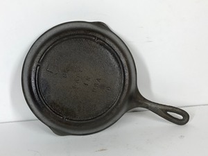 lot 146 image: Vintage Cast Iron Skillet - Bottom Says - 5 SK Made in USA D