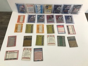 lot 423 image: Lot of Football & Baseball Collectible Cards - Kirby Puckett - Ken Griffey Jr. - Nolan Ryan - Troy Aitkin - Peyton Manning & More