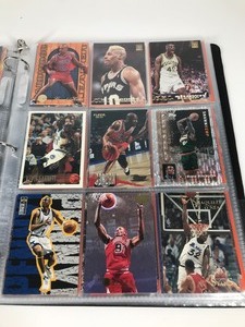 lot 424 image: Lot of Basketball Cards in Plastic Sleeves & Binder - 15 Michael Jordan Cards - Kevin Garnett - Rodman - Shaq - Hill - Hardaway - Kemp  & More