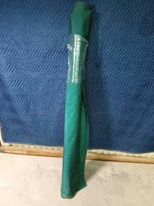 lot 343 image: Partial roll of green canvas upholstery material