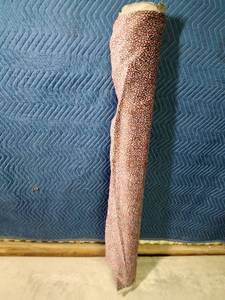 lot 330 image: Roll of maroon printed upholstery fabric