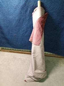 lot 326 image: Partial roll of velour Lt. burgundy upholstery fabric
