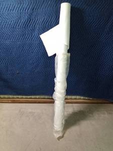 lot 327 image: Partial roll of white vinyl upholstery material