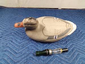 lot 290 image: Duck decoy and goose call