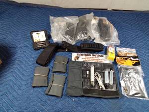 lot 273 image: New ammo belts, pocket gun cleaning kits, damaged screw removal kit and more