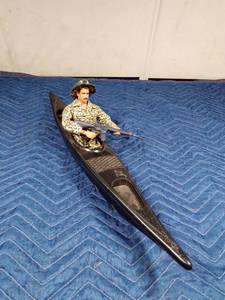 lot 256 image: Toy GI in kayak with rifle