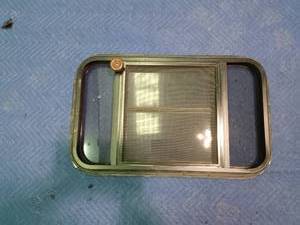 lot 235 image: Camper window with crank 0ut duel window with screen