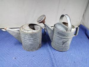 lot 221 image: 2 Vintage lg metal watering cans