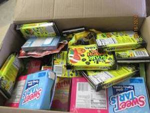 lot 13 image: box of candy and more in date...