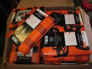 lot 86 image: box full of halloween table cloths...