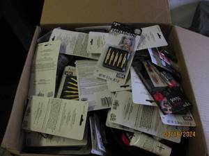 lot 91 image: box of fake blood and makeup sticks...