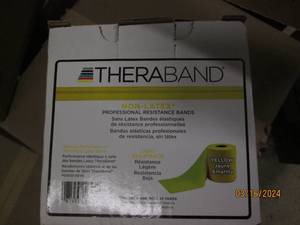 lot 163 image: yellow theraband 25 yards...