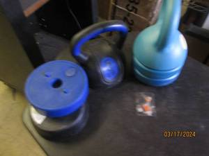 lot 211 image: 2 kettle bells...