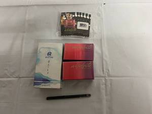 4 Parfum Sprays and Eye Liner Pencil