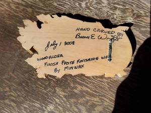 Hand carving, signed by artist