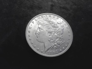 lot 13 image: 1884 Morgan Silver Dollar