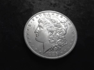 lot 18 image: 1885 O Morgan Silver Dollar