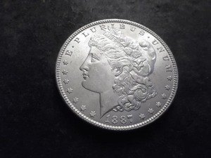 lot 21 image: 1887 Morgan Silver Dollar