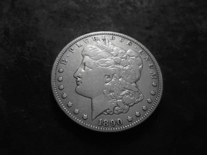 lot 23 image: 1890 CC Morgan Silver Dollar