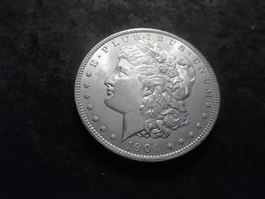lot 36 image: 1904 O Morgan Silver Dollar