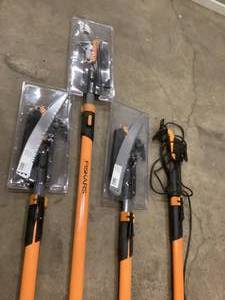 lot 7 image: Lot of 4 Fiskars Power Lever 1-18 in. Cut Capacity Steel Saw Blade 15 in. Fiberglass Pole 14 ft. Tree Pruner Customer Returns See Pictures