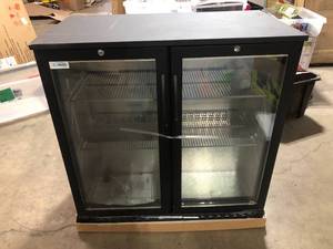 lot 21 image: Koolmore 35 in. W 7.4 cu. ft. 2-Glass Door Counter Height Back Bar Cooler Refrigerator with LED Lighting in Black Customer Returns See Pictures