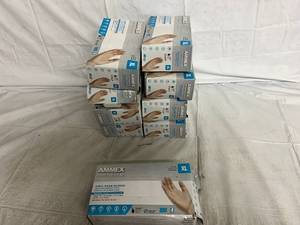 9 Packs of Ammex Professional Vinyl Exam Gloves - XL