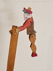 lot 110 image: Primitive French Acrobat Toys