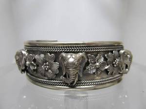 lot 65 image: Heavy Thick Sterling Silver Bracelet wElephant & Flowers
